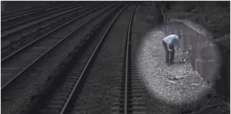 Dijete na željezničkim tračnicama