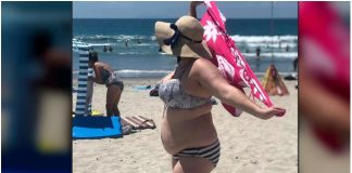 Muškarci rugali ženi na plaži