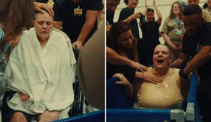 Žena ostavila invalidska kolica i masku s kisikom kako bi se krstila u zatvoru